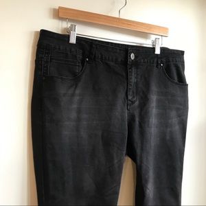 Faded black moto jeans with zips and knee detail